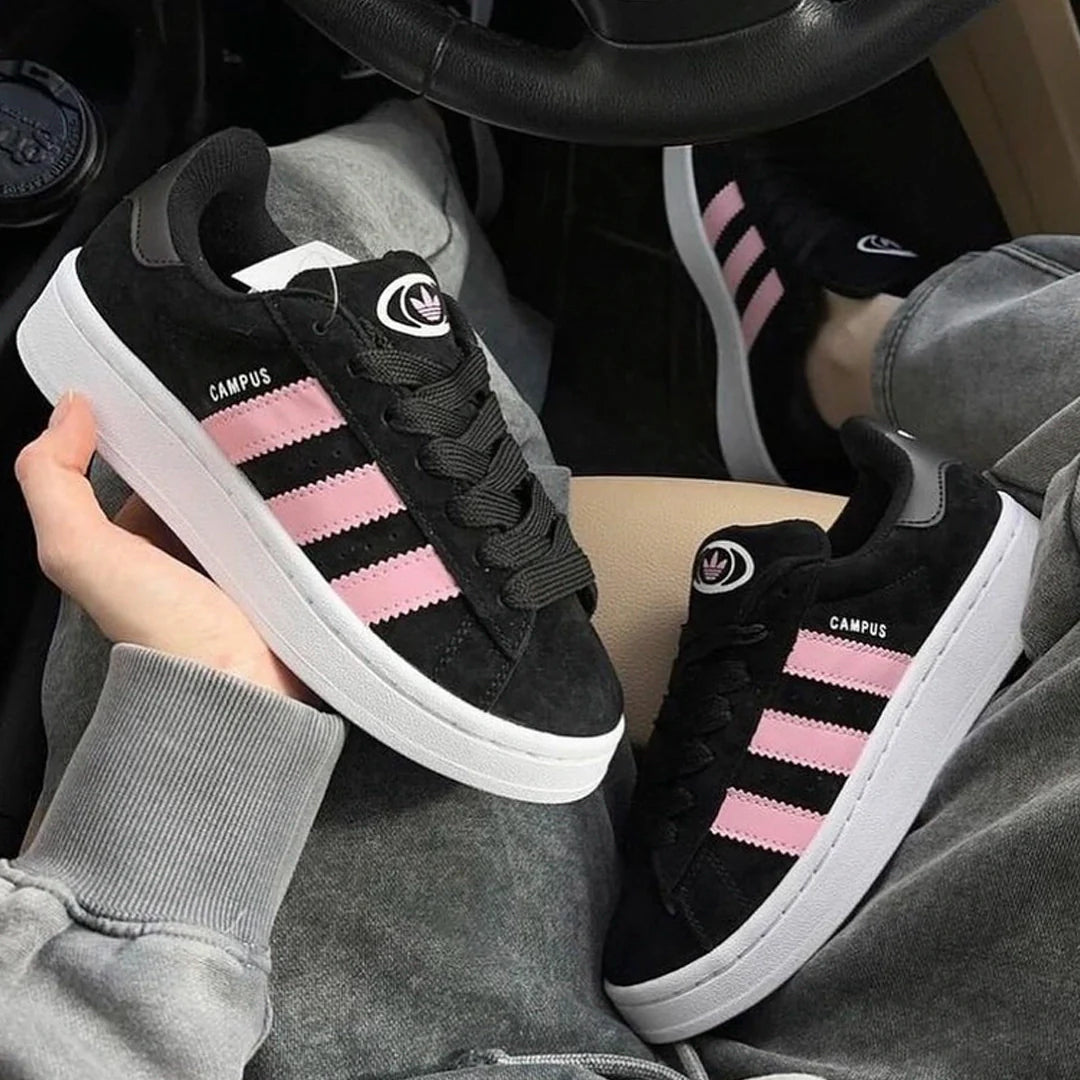 Model wearing Adidas Campus True Pink sneakers