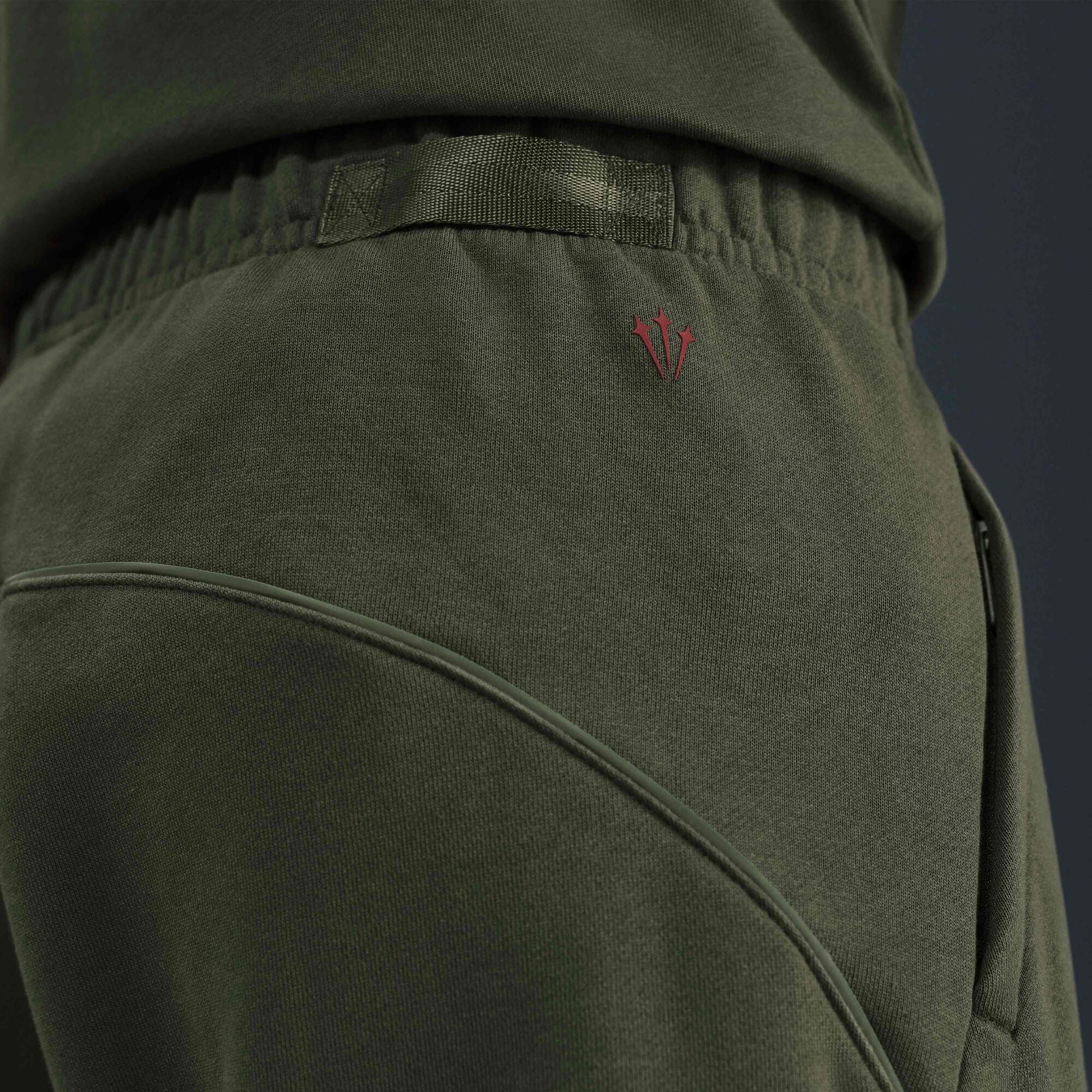 NOCTA NOCTA Fleece CS Open-Hem Tracksuit Bottoms Cargo Khaki/Cargo Khaki/Team Red